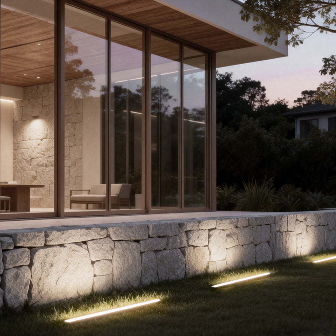 LED wall washer light illuminating modern outdoor steps and garden area, creating a warm and inviting ambiance.