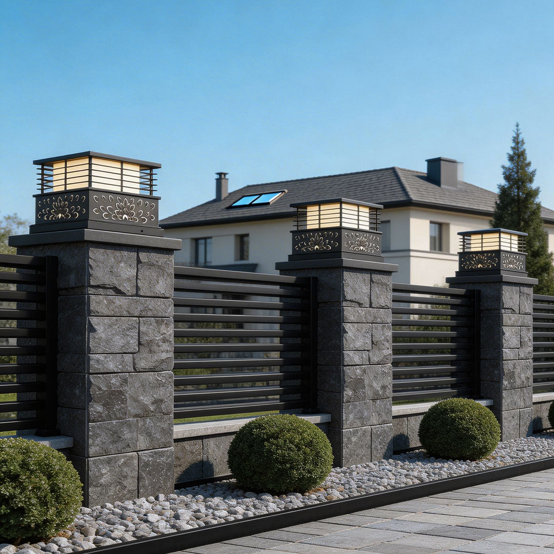 Elegant light pillar for home mounted on stone pillars at the entrance of a luxurious residence.