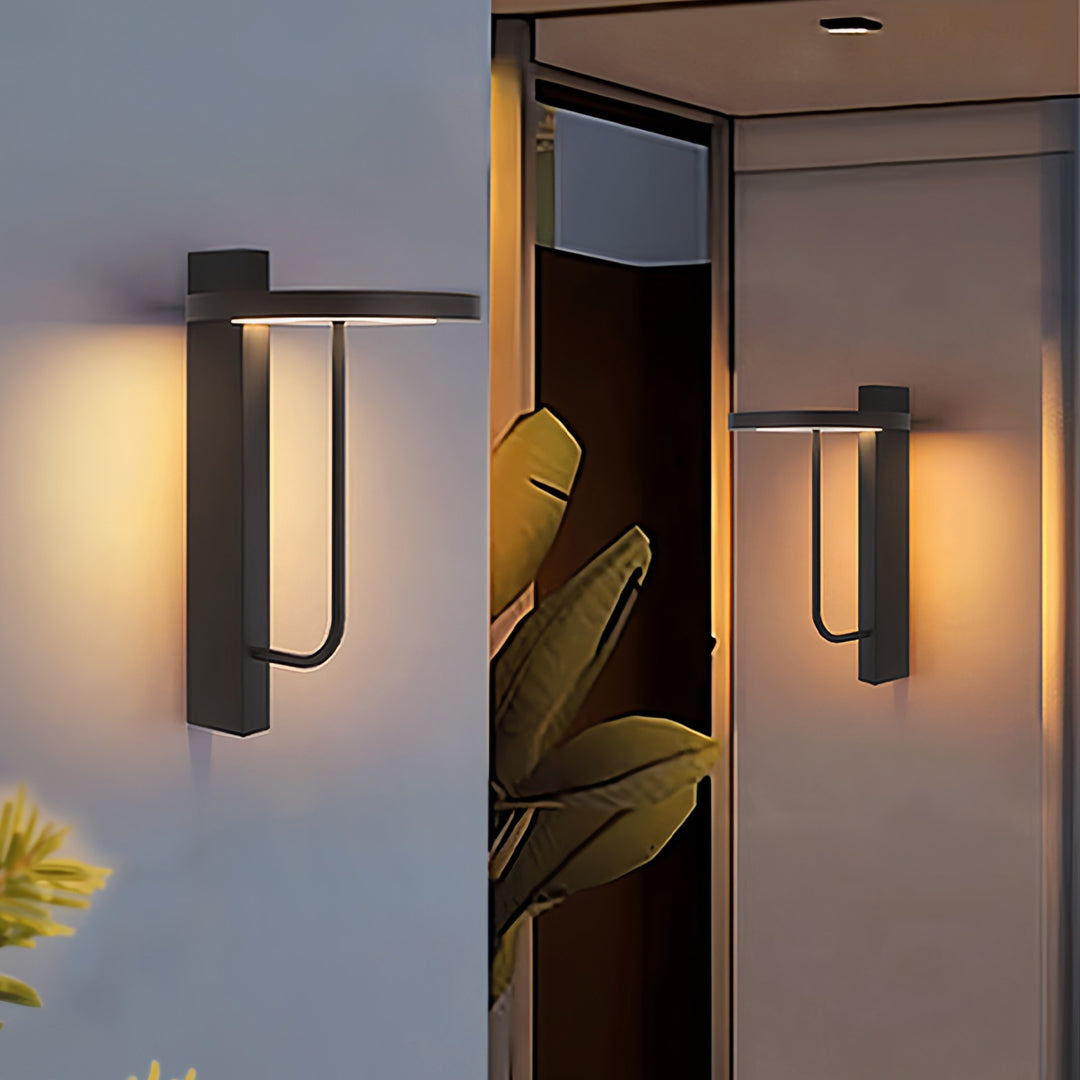 Warm glowing light sconces outdoor used near a modern door entrance for ambient lighting.