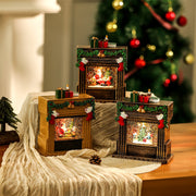 gold-tone christmas fireplace ornament with internal LED lights and festive garlands