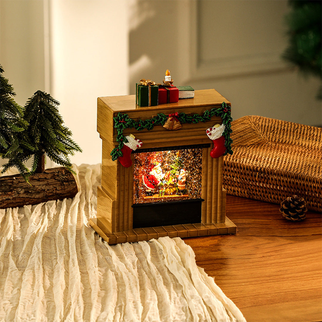 gold-tone christmas fireplace ornament with internal LED lights and festive garlands