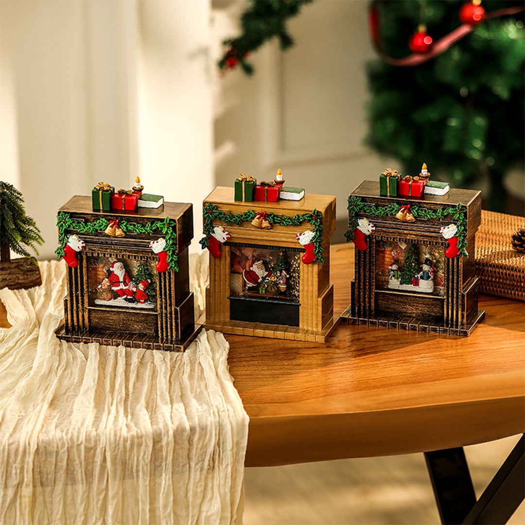 gold-tone christmas fireplace ornament with internal LED lights and festive garlands