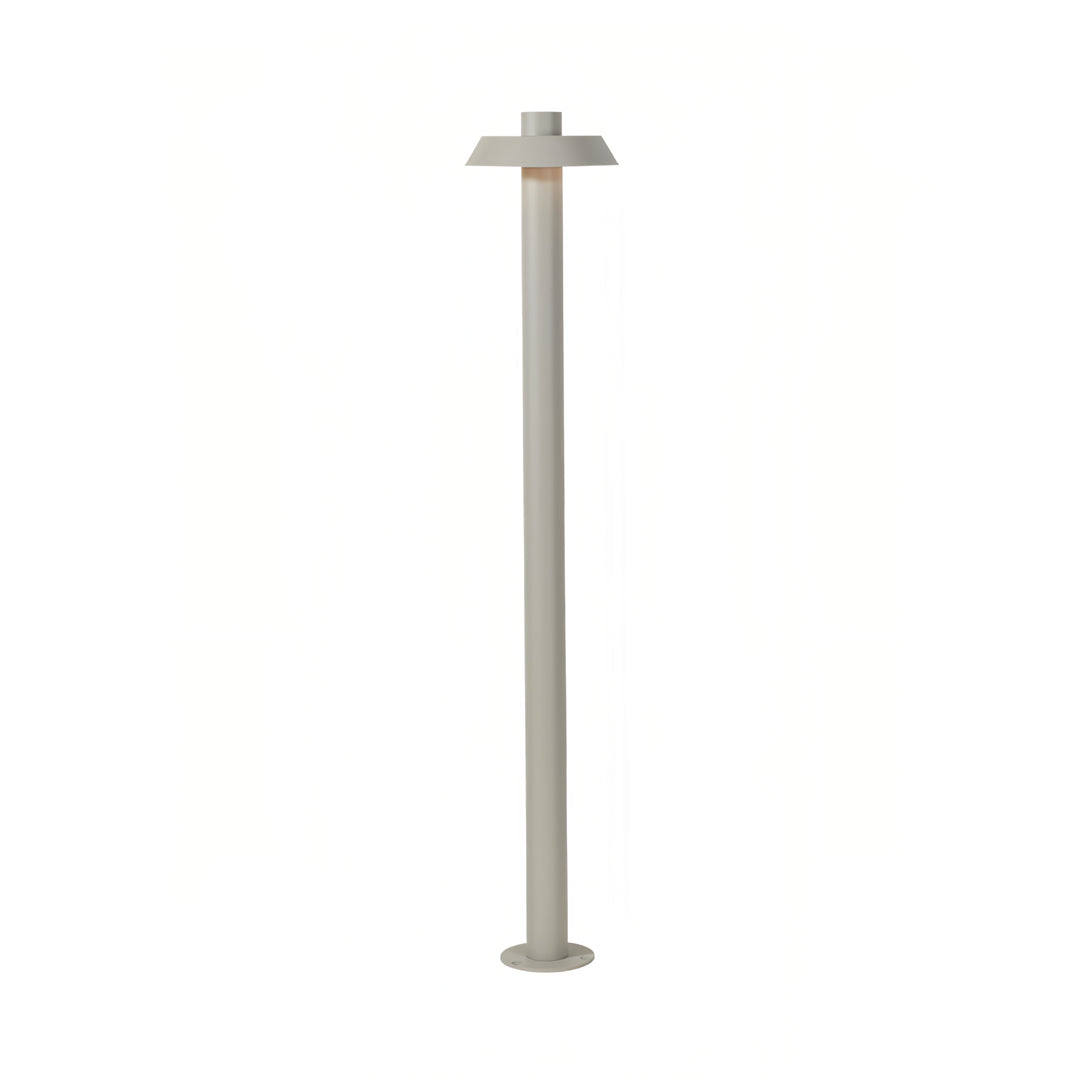 Light grey aluminum path lights in a tall, simple form offering clean and modern exterior lighting.