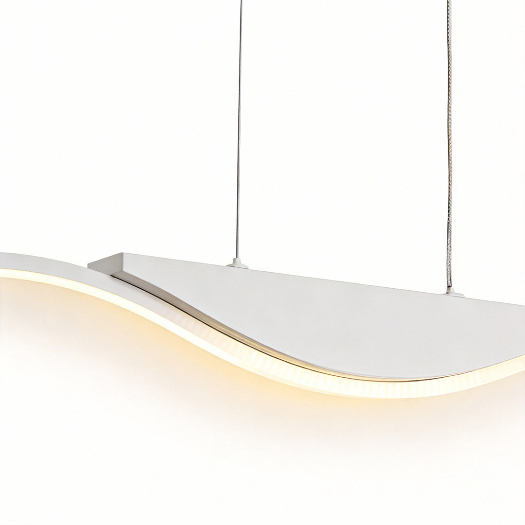 A close-up of the line wave pendant light, showcasing its unique wave design that adds a touch of artful elegance to any modern room.