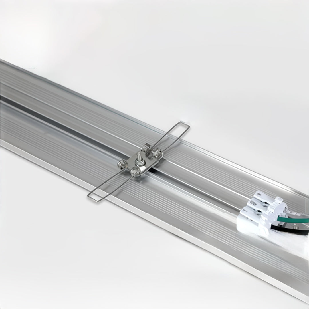 Close-up detail of linear ceiling light mounting hardware and aluminum housing.