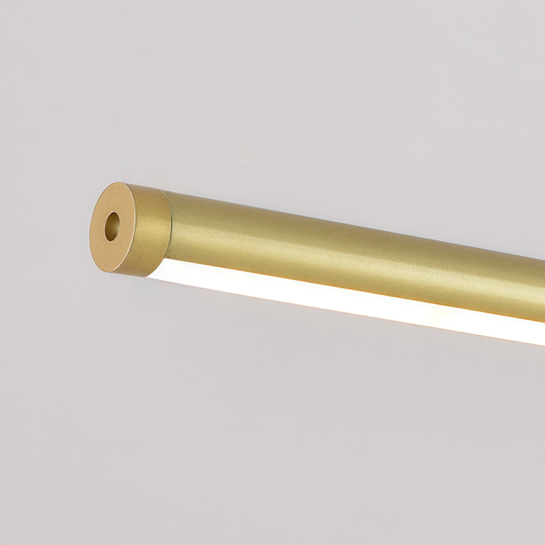 Close-up detail of linear gold pendant light with integrated LED lighting strip.