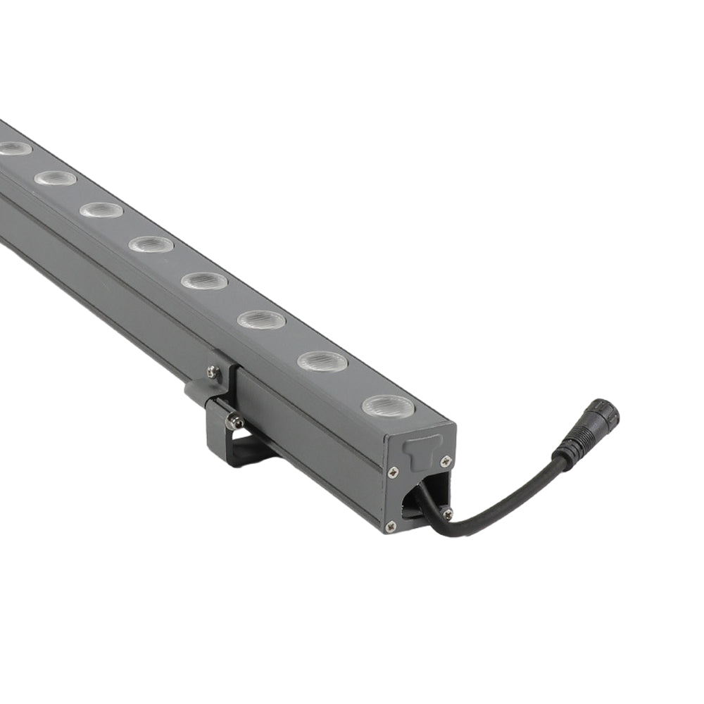 Complete linear LED wall washer light with mounting bracket and power cable.