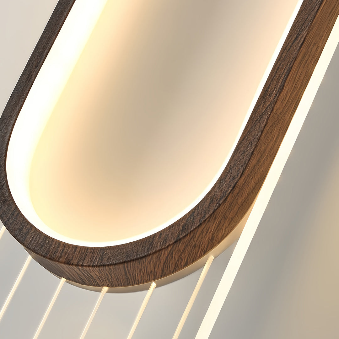 Close-up detail of linear led wall light showing curved design with warm lighting effect and textured surface