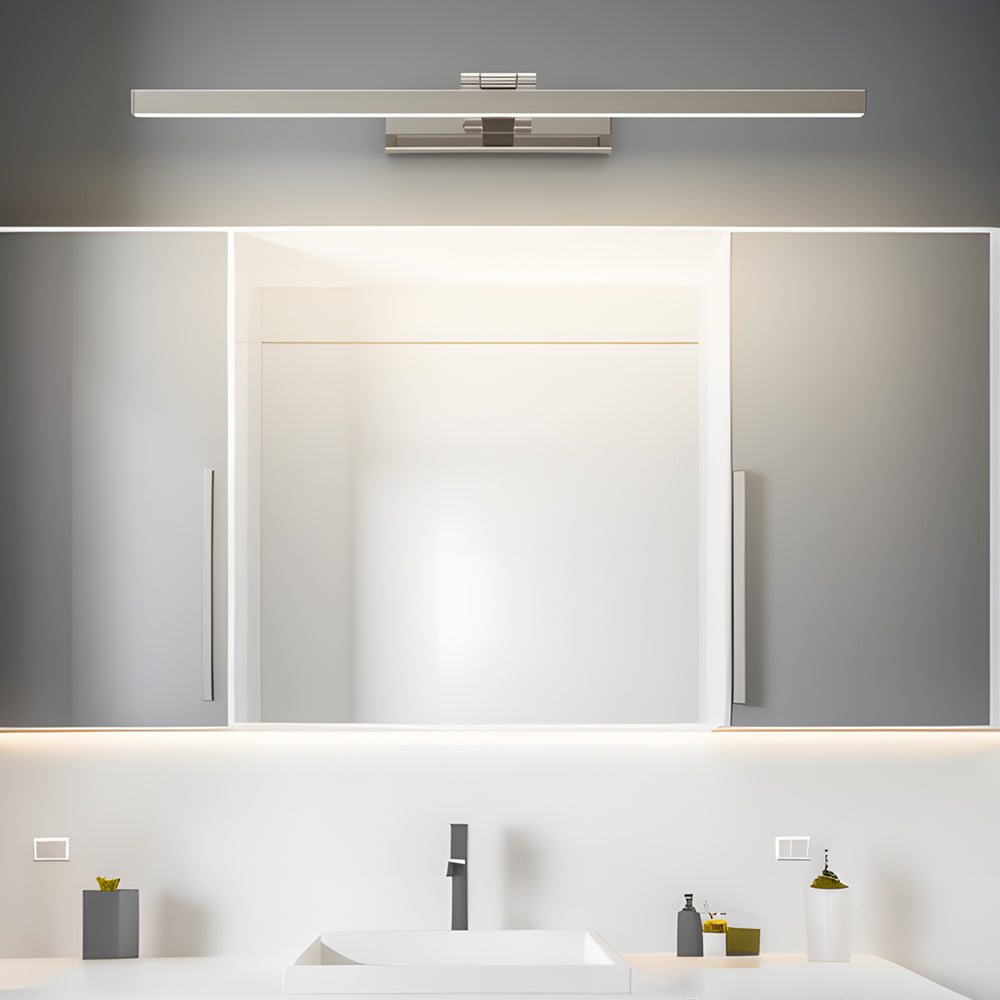 Linear light bars for bathroom vanity providing even illumination above a double sink mirror