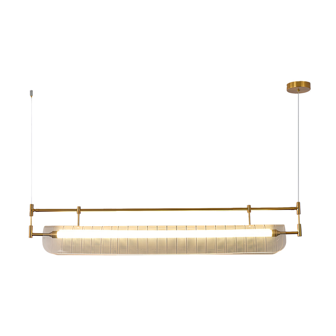 Linear light pendant in warm gold finish featuring elongated pleated glass shade with minimalist mounting