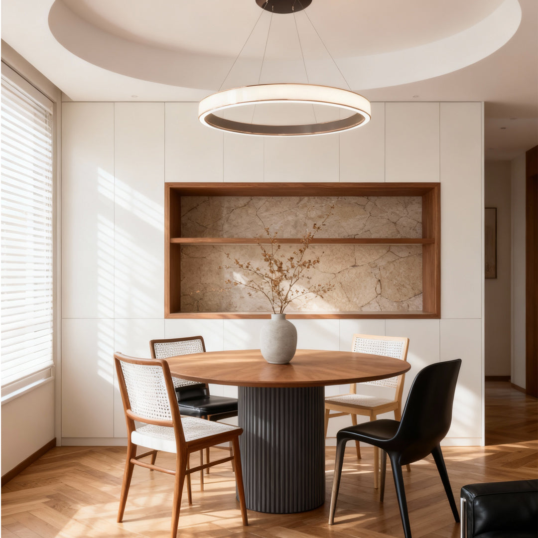 Contemporary dining room illuminated by soft-glow linear suspension light fixtures.