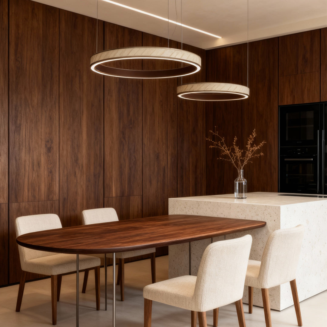 Sophisticated dining area with multi-layer linear suspension light fixtures in a modern luxury style.