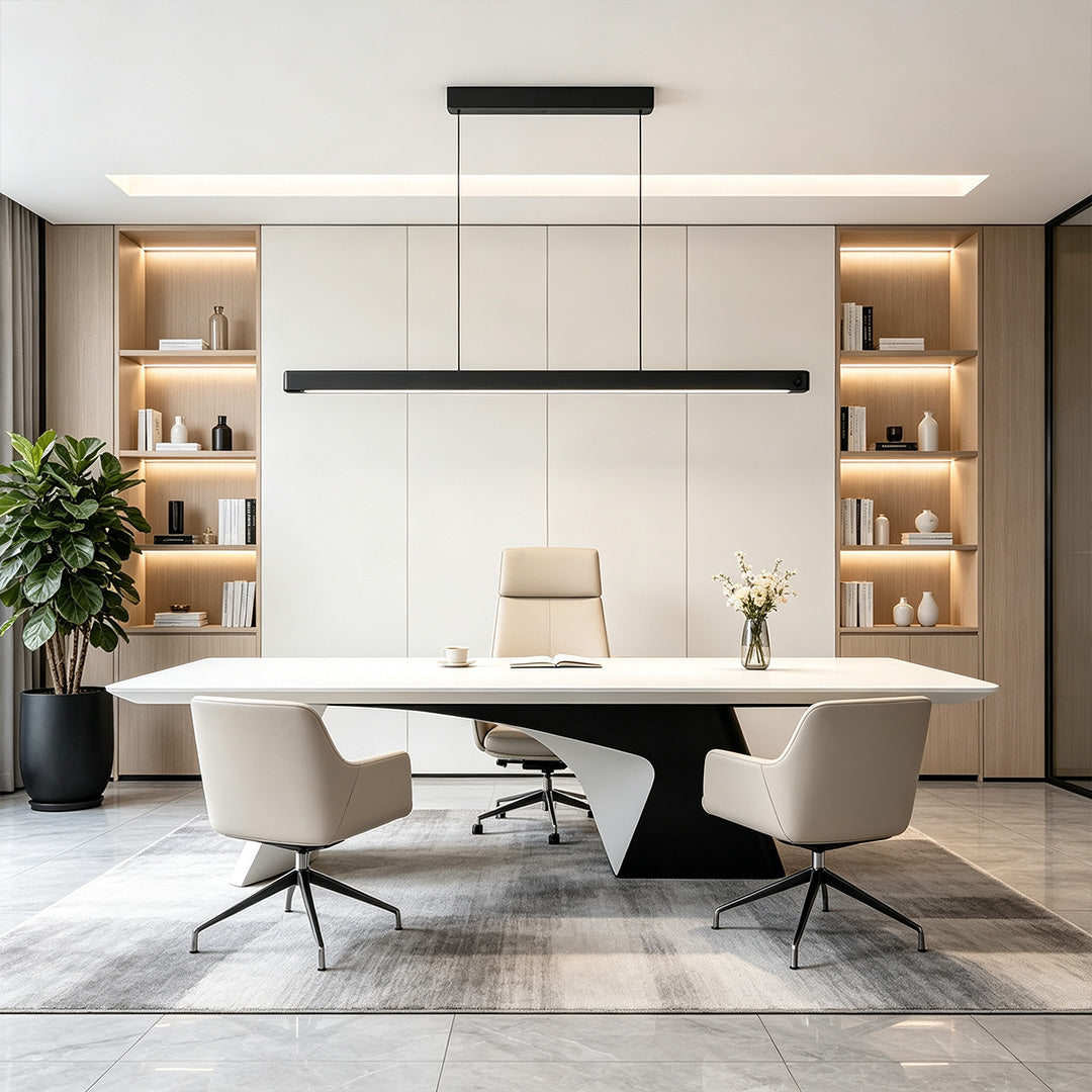 Modern linear suspension lighting fixtures installed above a luxury executive office desk with minimalist workspace design.