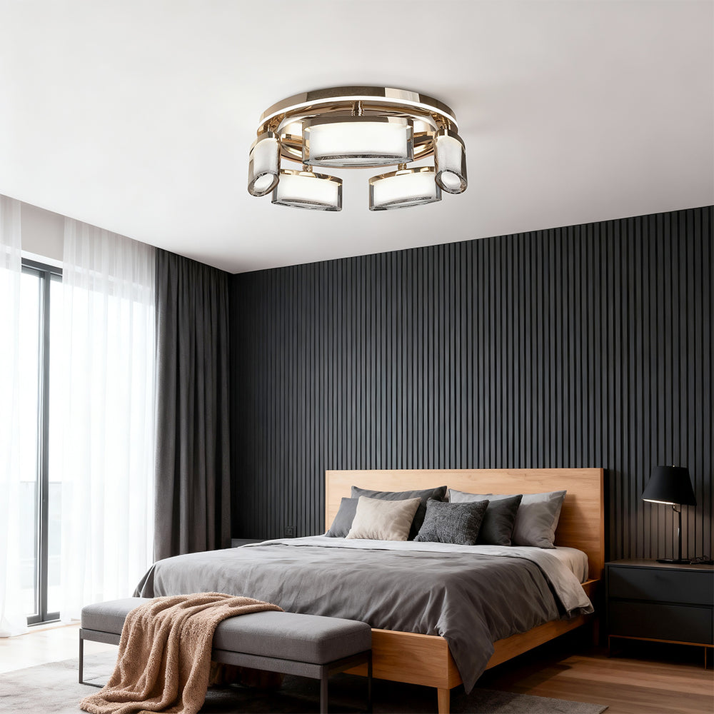 Linear suspension lighting as focal point in sophisticated bedroom with dark fluted wall and leather bed frame