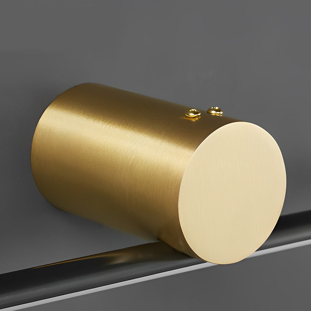 Close-up of brushed gold linear vanity light bar mounting detail