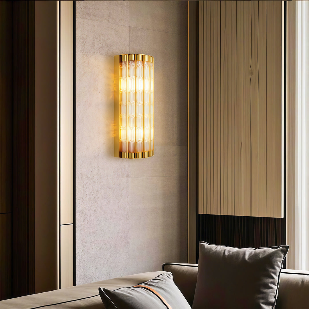 Modern luxury linear wall light inspired wall mounted hanging light illuminating bedroom with dark bedding.