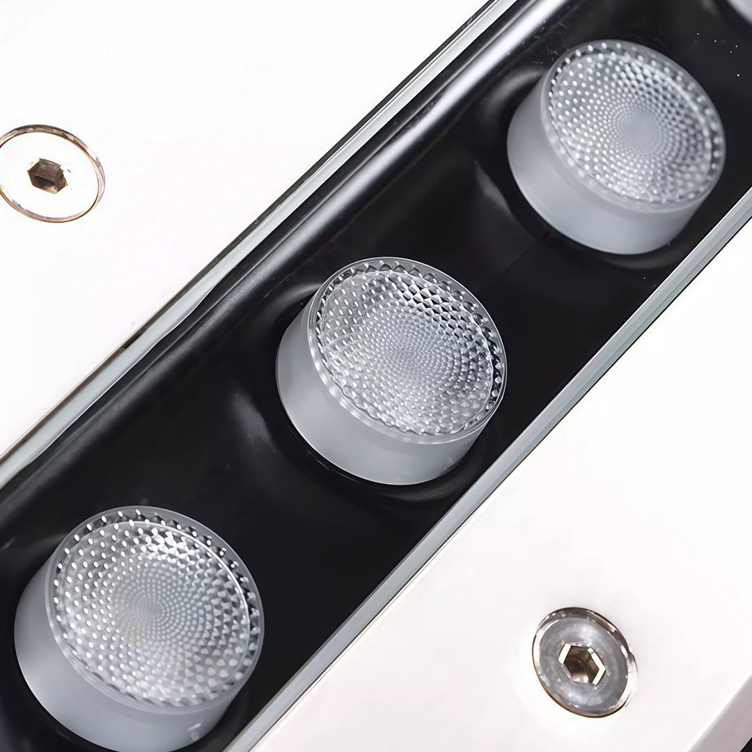 Close-up of LED lenses on linear wall washer light showing optical design.