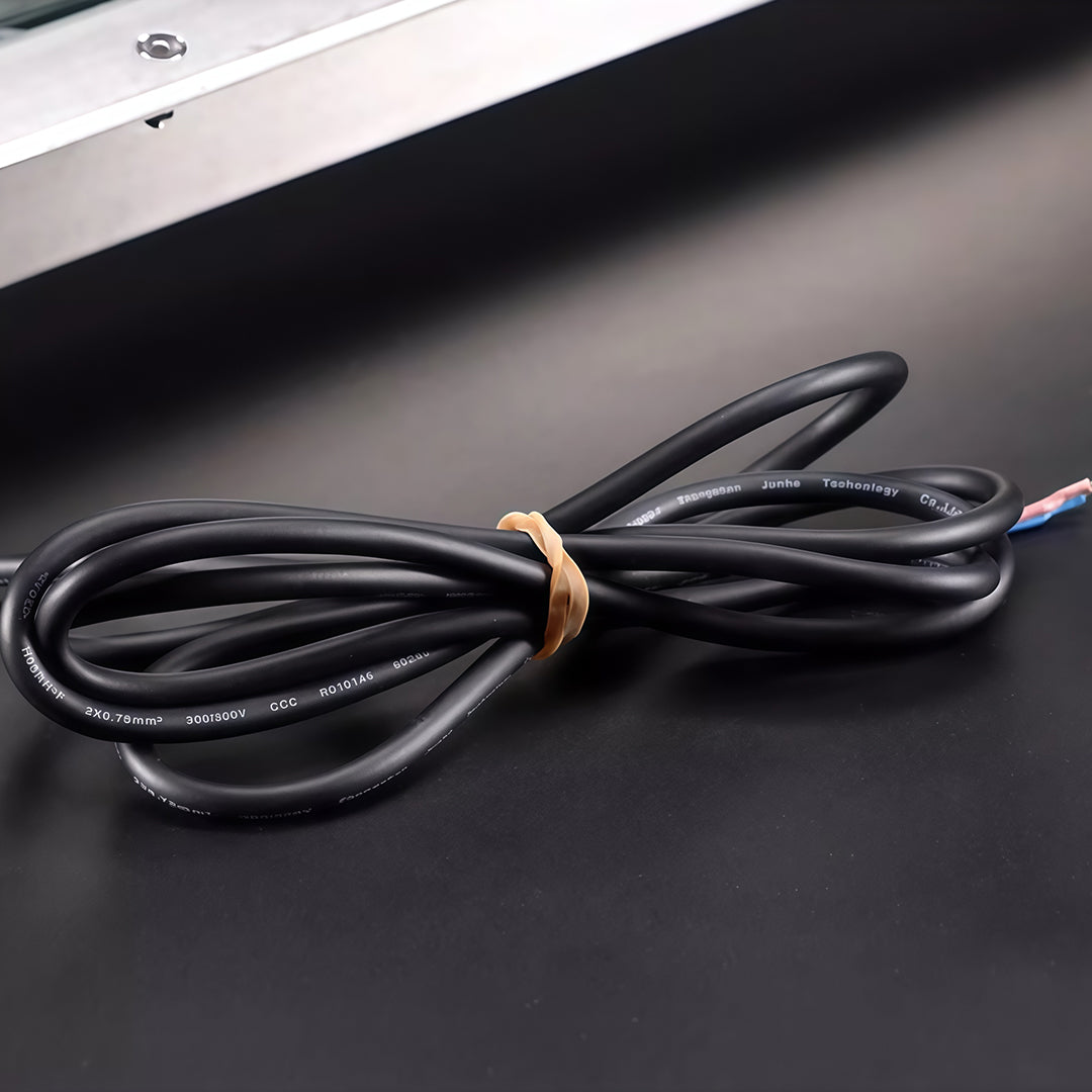 LED linear wall washer light with durable black power cord.