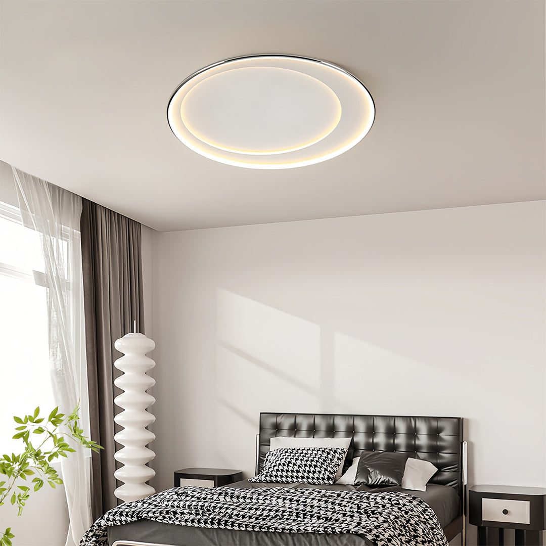 Stylish LED round flush mount light creating ambient lighting in contemporary living room space