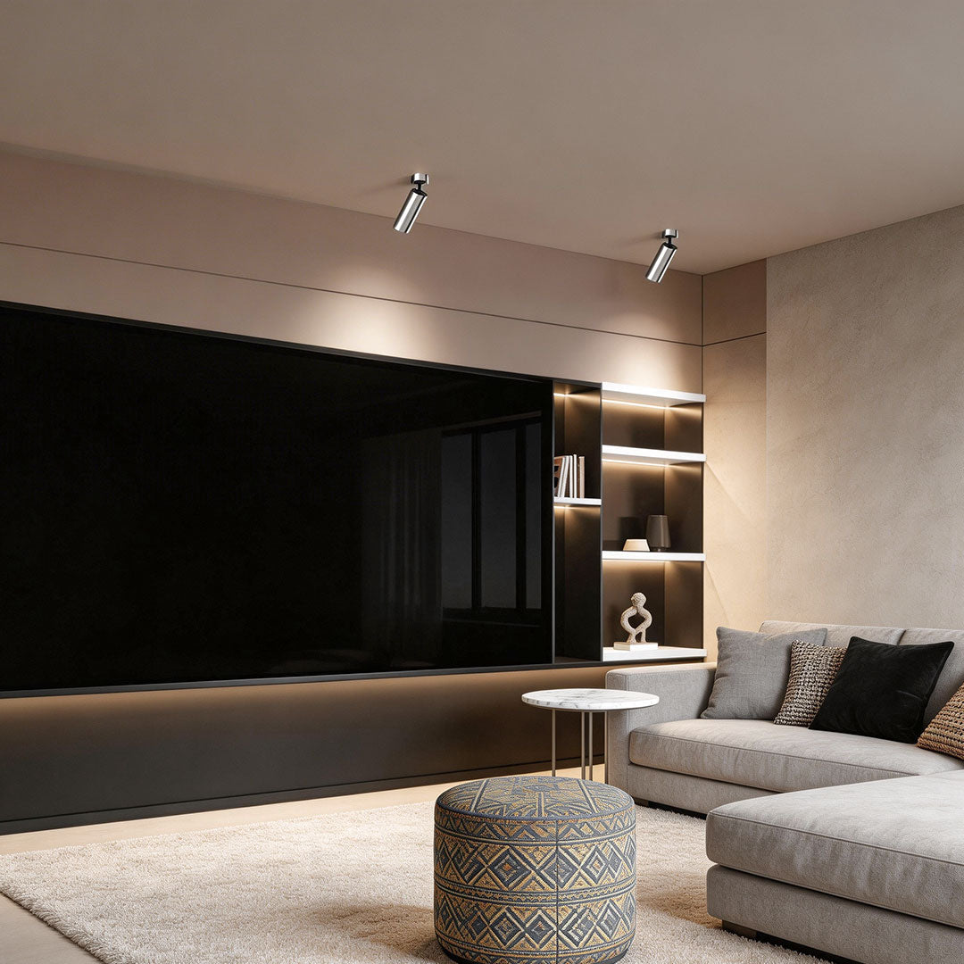 Modern living room with spotlight light fixture showcasing minimalist decor.