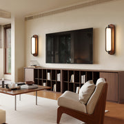 Wall mount outdoor solar lights arranged on a living-room wall near a TV setup.