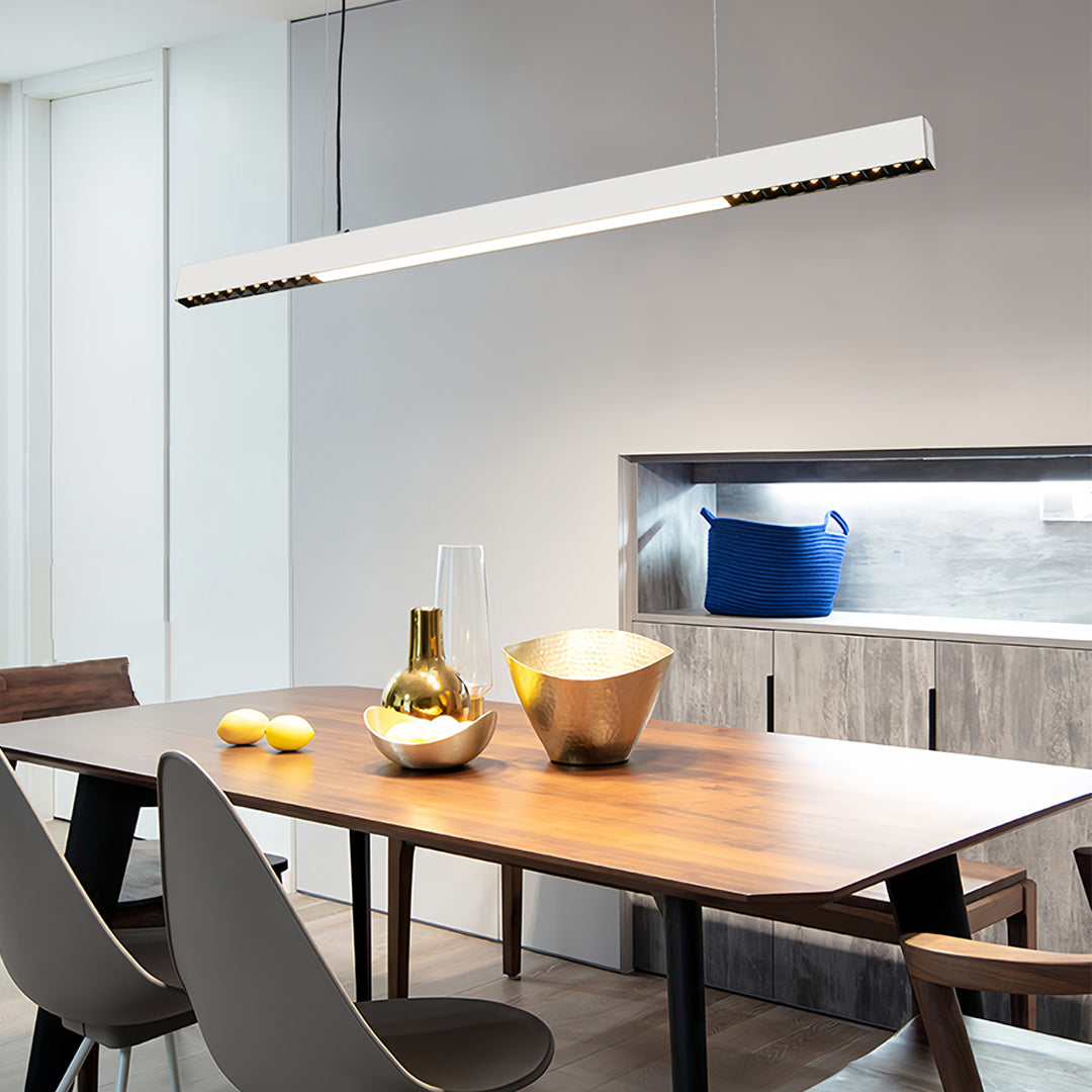 Living space showcasing black linear light pendant with contemporary styling and efficient lighting