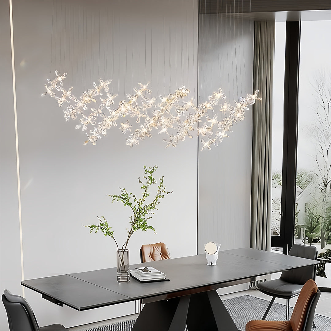 Modern living space featuring rock crystal chandelier as centerpiece with contemporary furniture styling
