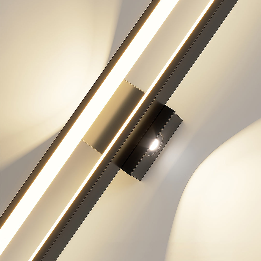 Wall art led lights mounted in a living room with contemporary framed artwork.