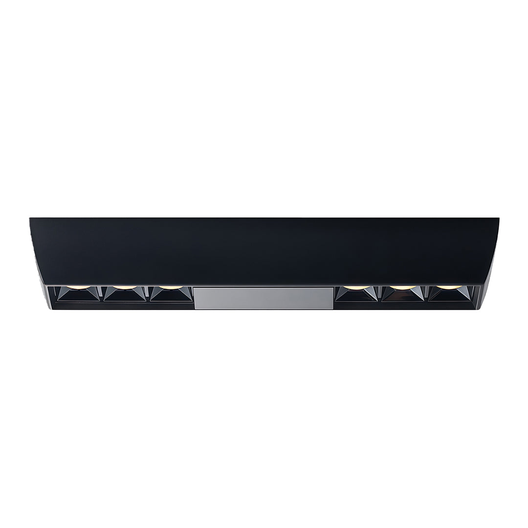 Long black rectangular multi-light fixture featuring a row of recessed square downlights.