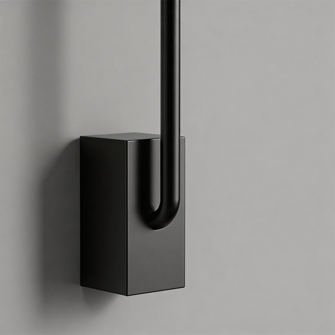 Long outdoor wall lights with a sleek linear design, mounted on a white wall.