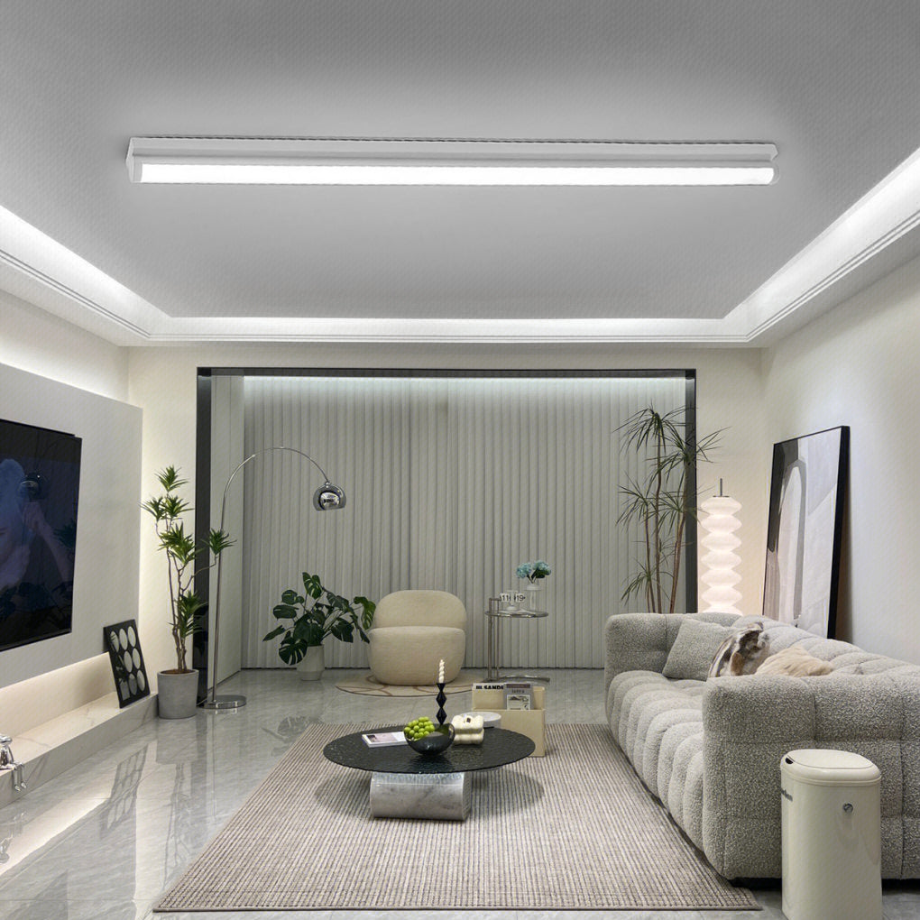Long strip ceiling light with a modern design, mounted on a white ceiling.