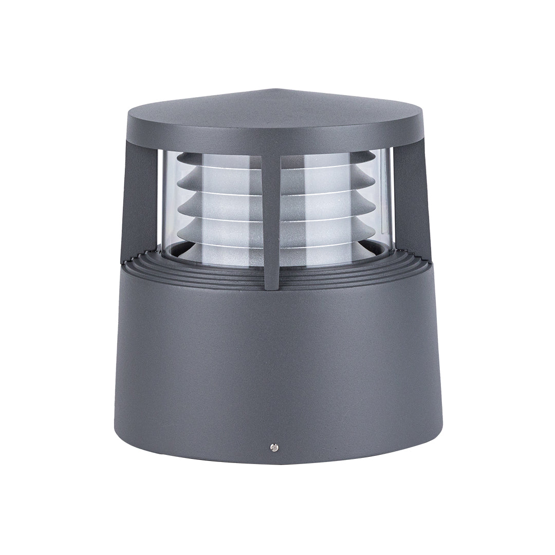 Modern round outdoor bollard light with horizontal louvered diffuser