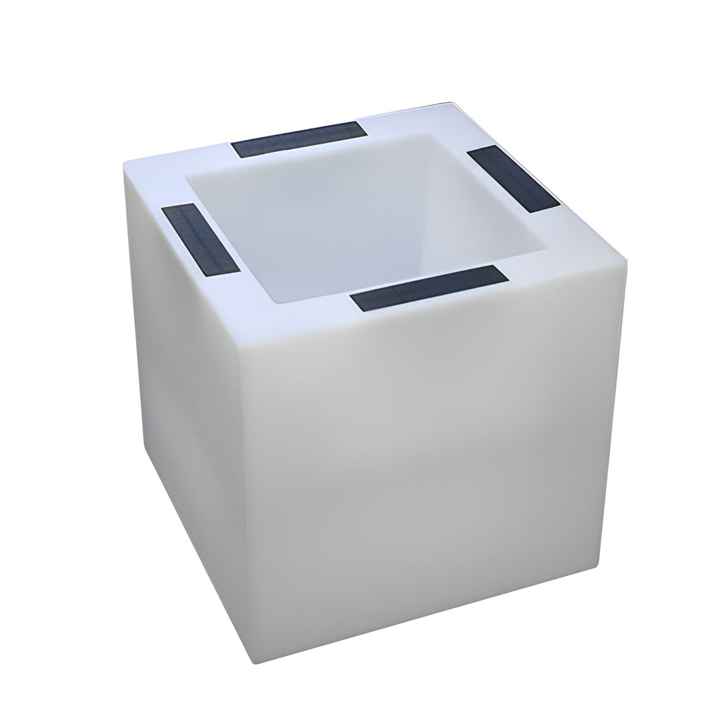 Luminous flower pots with a white finish, providing ambient light in a garden.