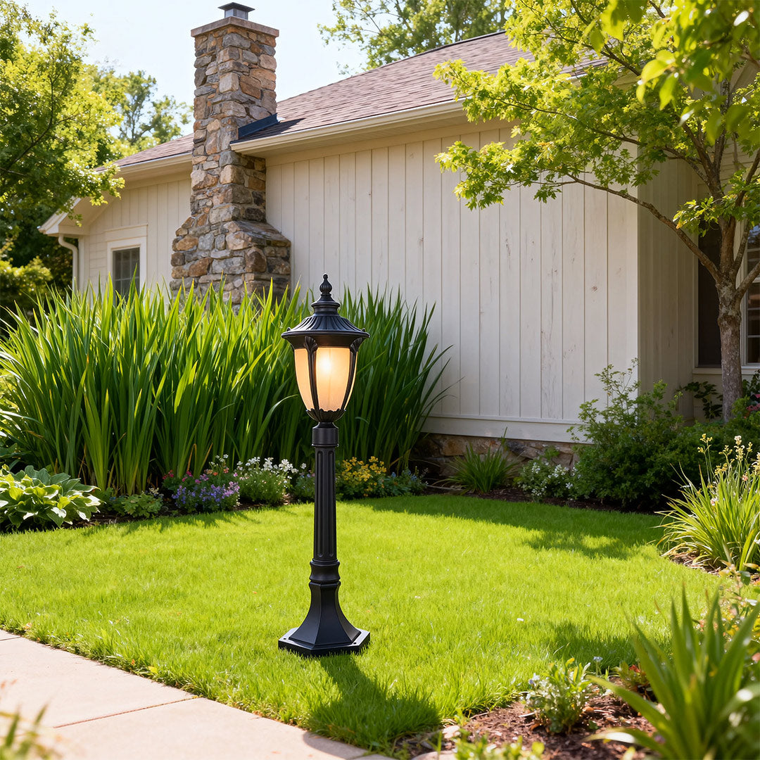 Bollard light for garden in a lush garden setting, elegant and functional outdoor lighting