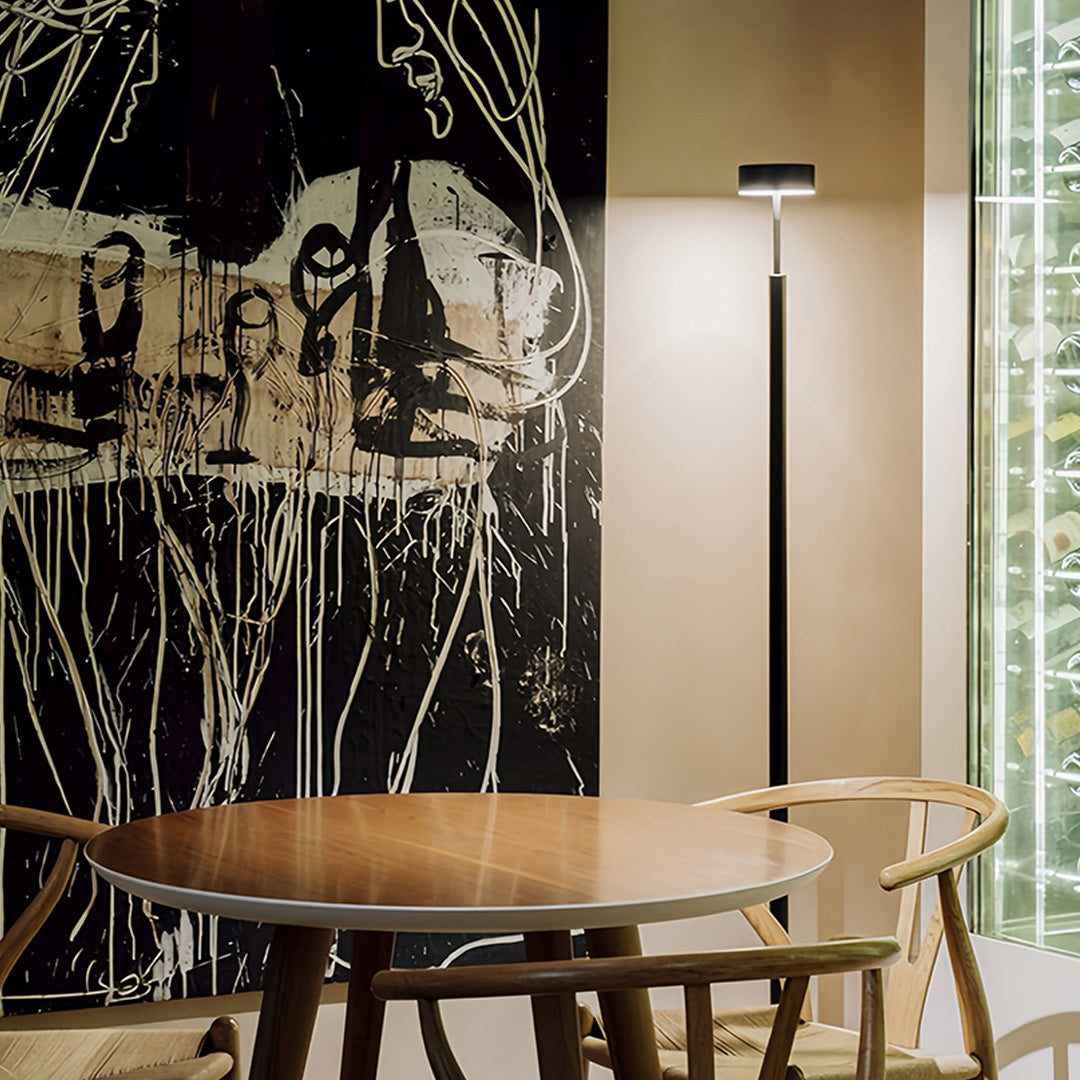 Luxurious dining room LED petite floor lamp creating warm ambient lighting for upscale interior design applications