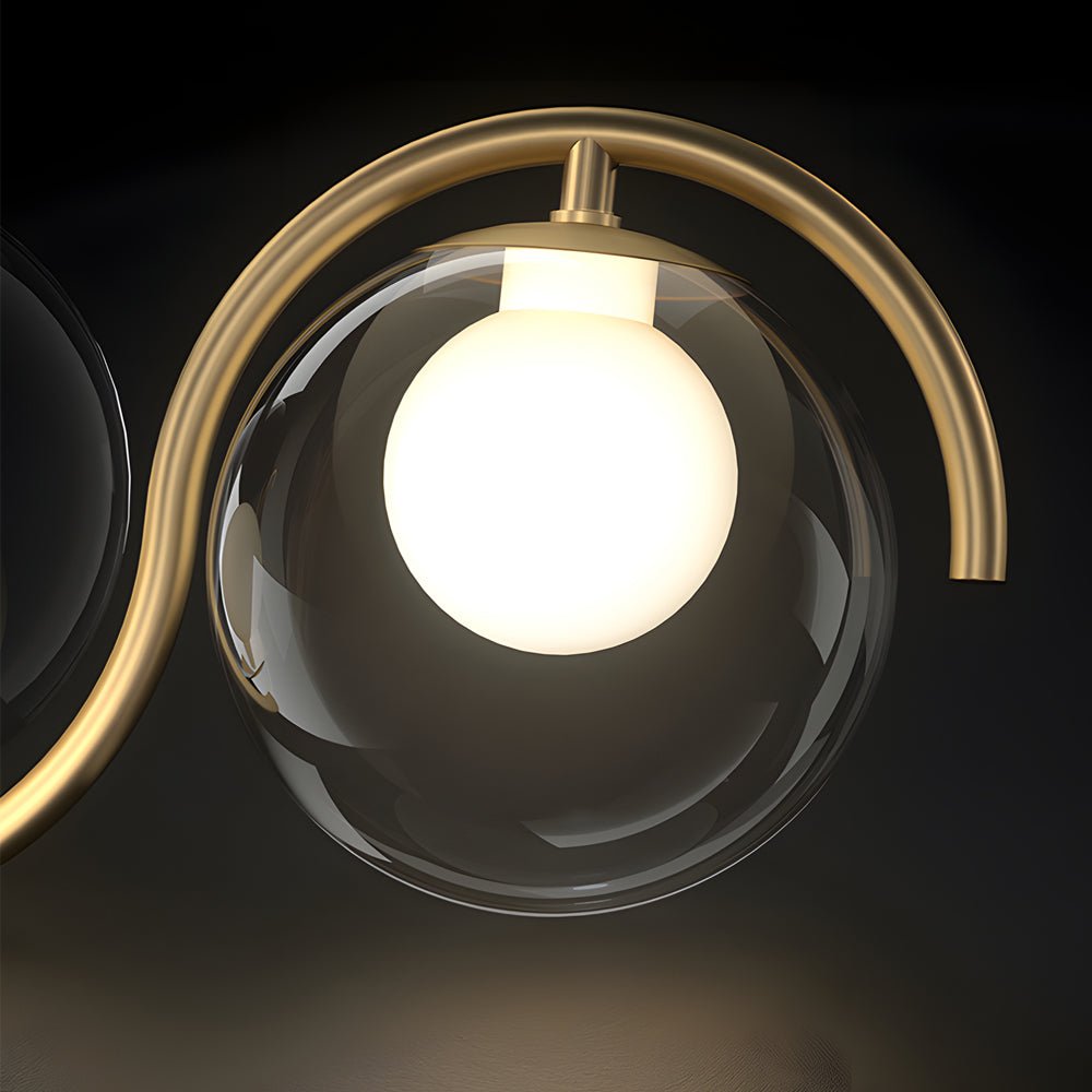 Luxurious glass ball linear chandelier featuring a minimalist gold frame and round glass orbs for soft lighting.