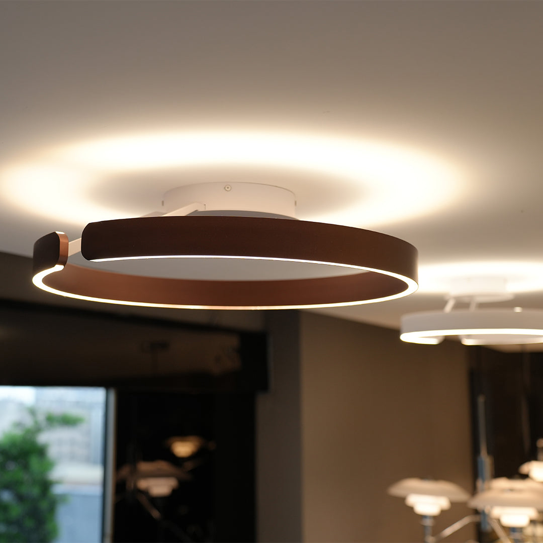 Luxurious halo flush mount ceiling light featuring glass shade chandelier design in wood finish illuminating elegant dining space.