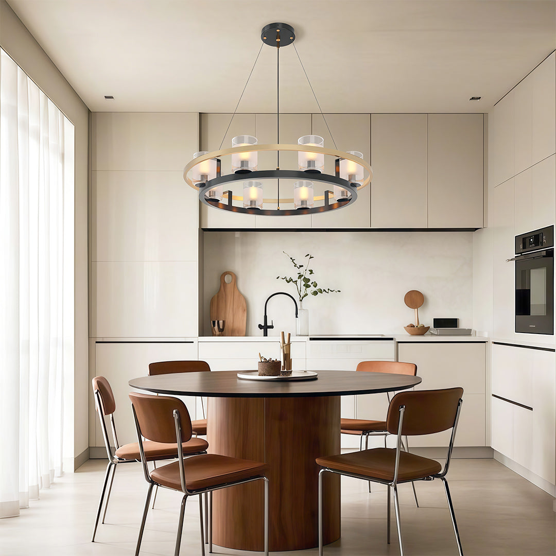 Luxurious modern luxury chandeliers suspended above a round dining table in a minimalist kitchen.
