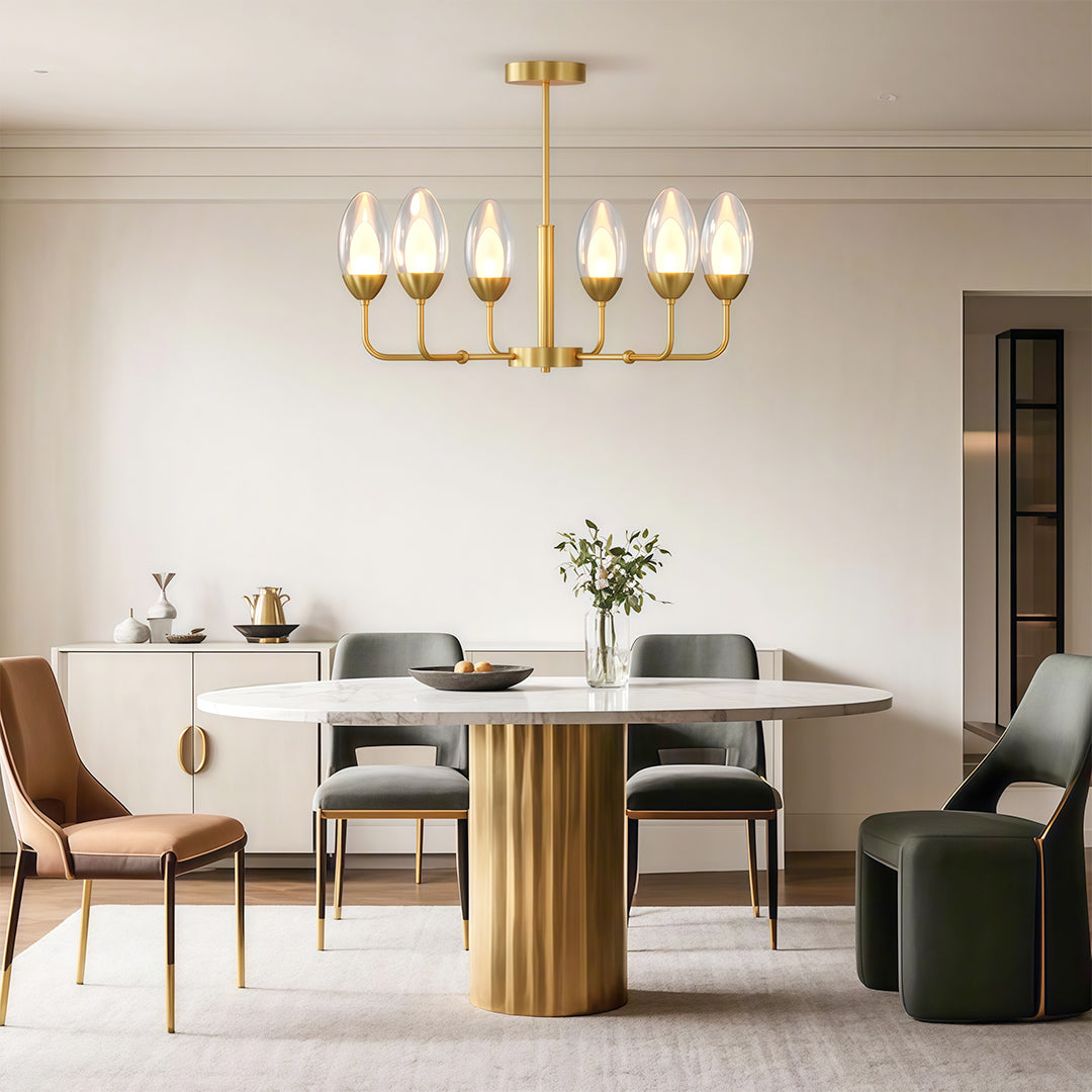 Luxurious modern minimalist chandelier featuring glass shade chandelier aesthetic creating warm ambiance above contemporary dining table.