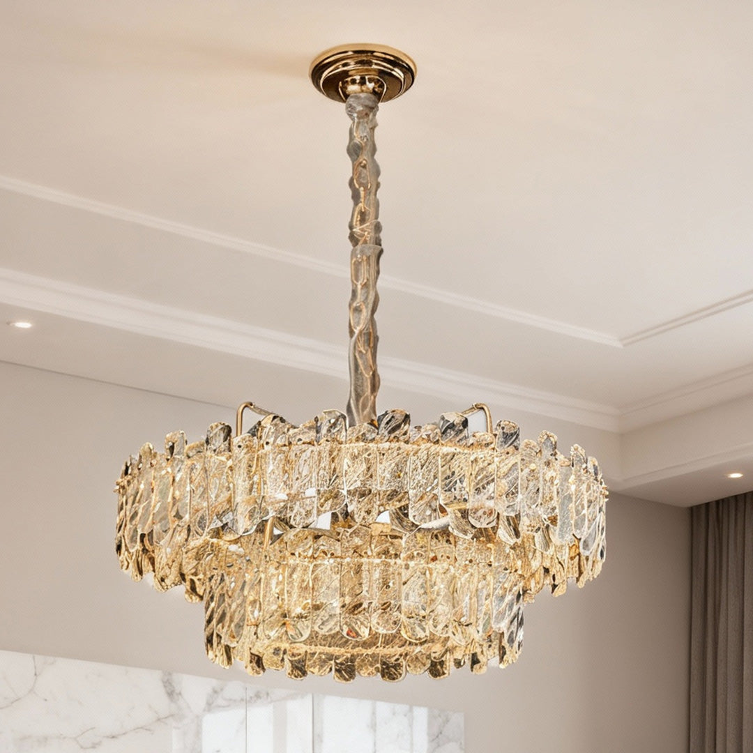 Luxurious nordic chandelier with glass shade chandelier influence illuminating serene neutral-toned dining interior with elegant simplicity.