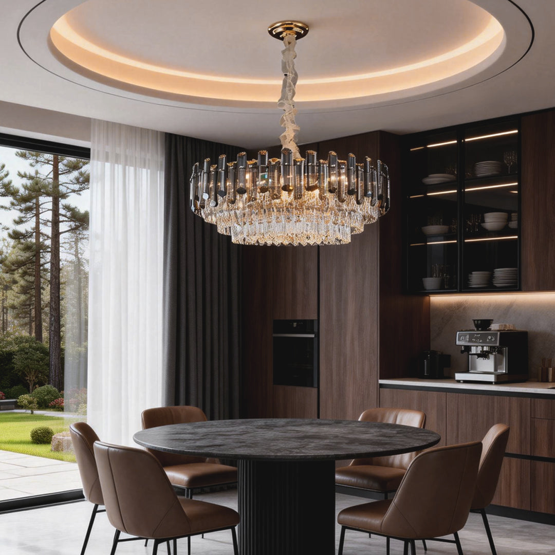 Luxurious round drum crystal chandelier hanging above a modern dining table, adding elegance to the space.