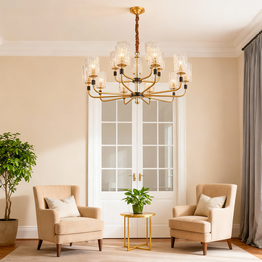 Modern luxury chandeliers above contemporary dining table with marble top and fireplace