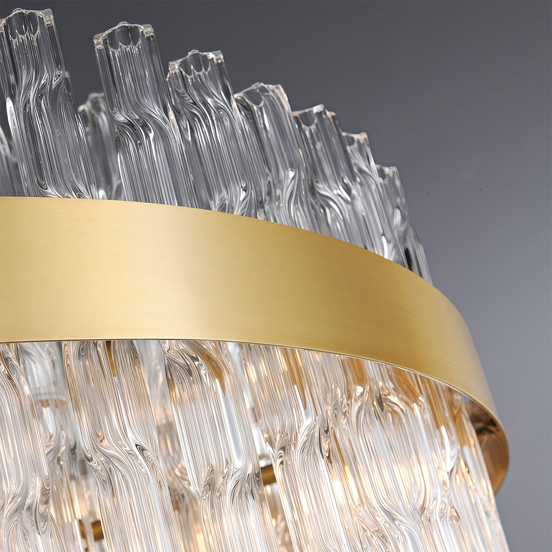 Modern luxury chandeliers detail view highlighting gold band and transparent crystal elements