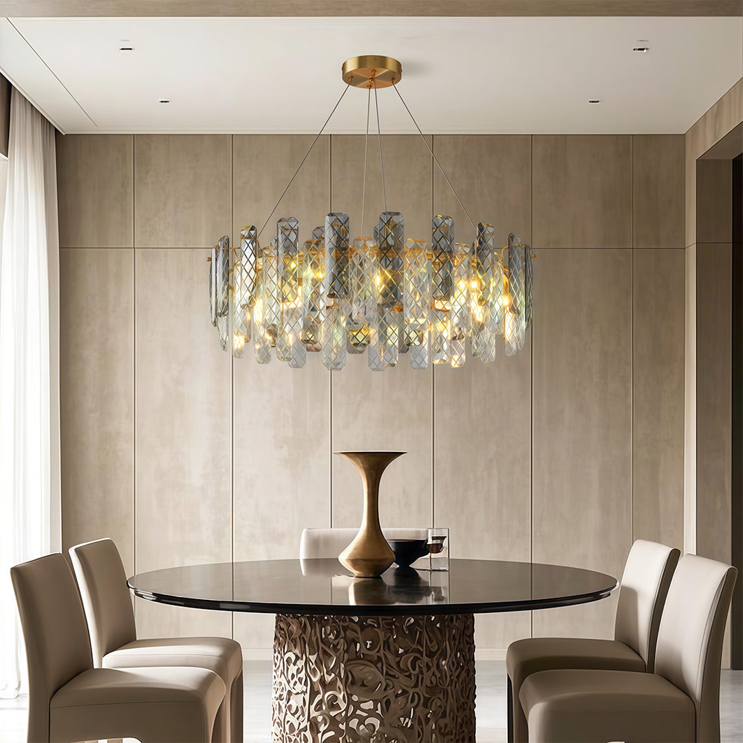 Modern luxury contemporary crystal chandeliers enhancing contemporary dining space with wooden table and designer chairs.