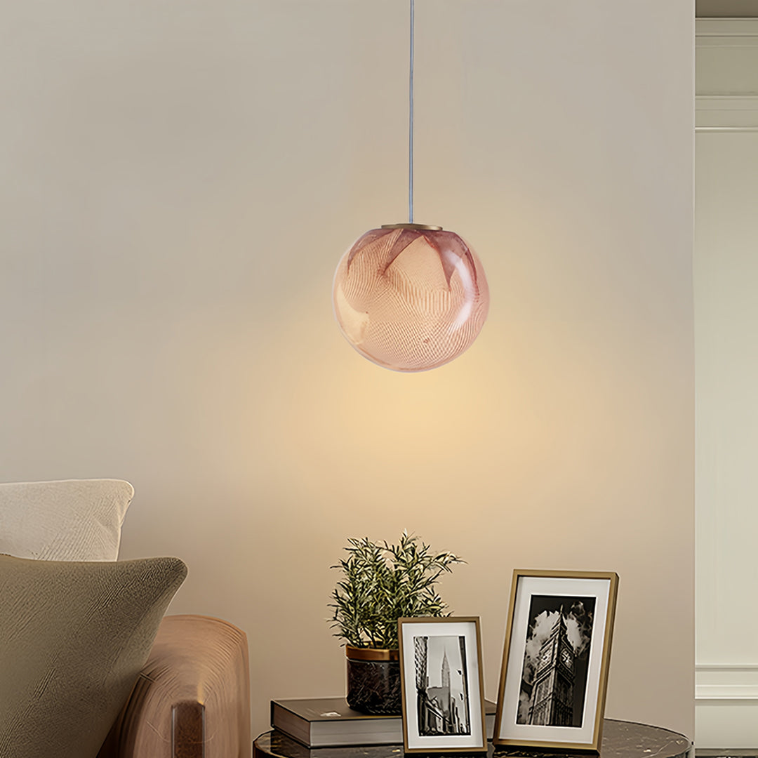 Premium glass globe pendant lights displaying rich copper glass construction with elegant spherical form for luxury interiors