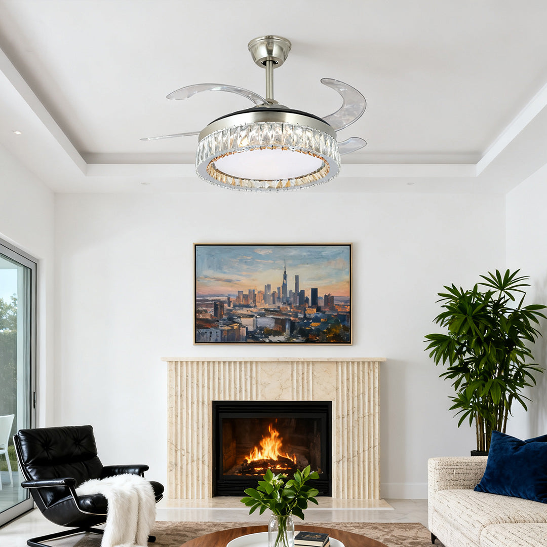 Luxury crystal ceiling fan with light fixture above a cozy living room fireplace 
