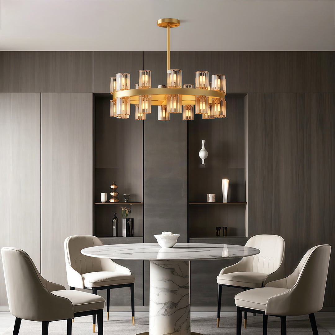 Luxury crystal chandeliers above contemporary dining table with round sculptural base.