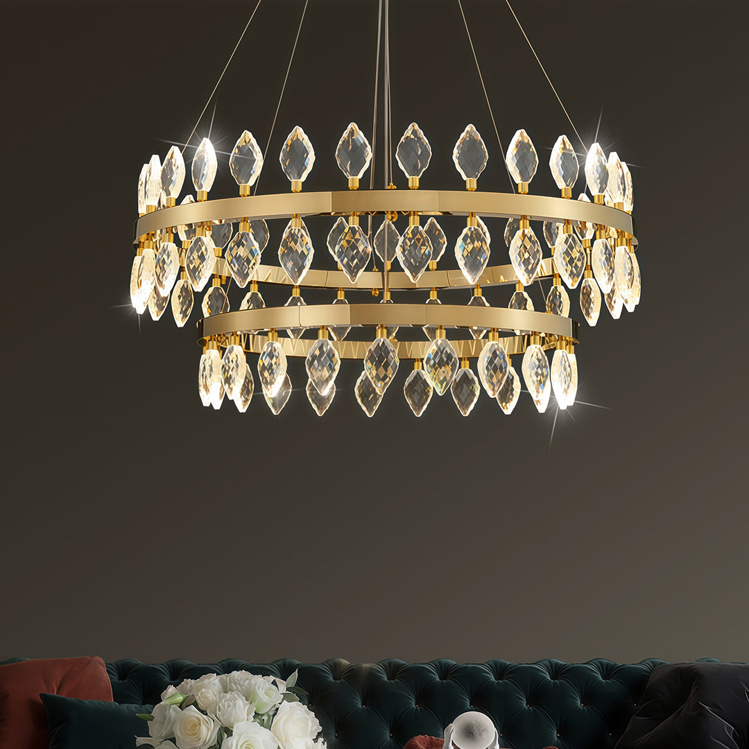 Luxury crystorama chandeliers hanging above a modern living room.