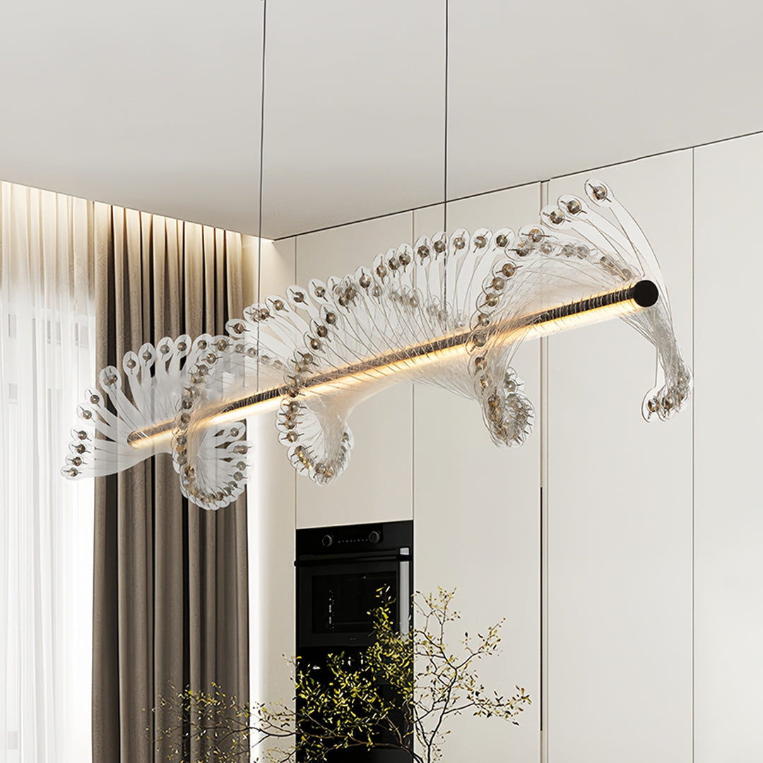 Artistic spiral chandelier combining curved metal framework with cascading crystal drops in luxury interior setting