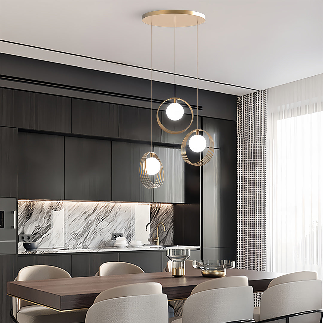 Luxury dining space with 3 bulb pendant light creating sophisticated ambient lighting atmosphere